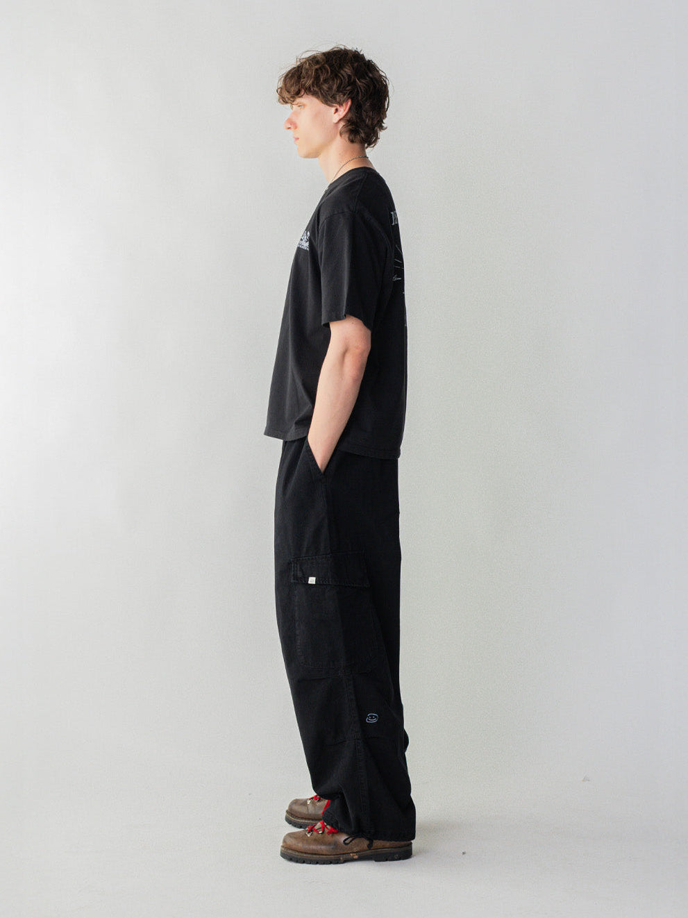 SMILEY LOGO PARACHUTE PANTS - BLACK