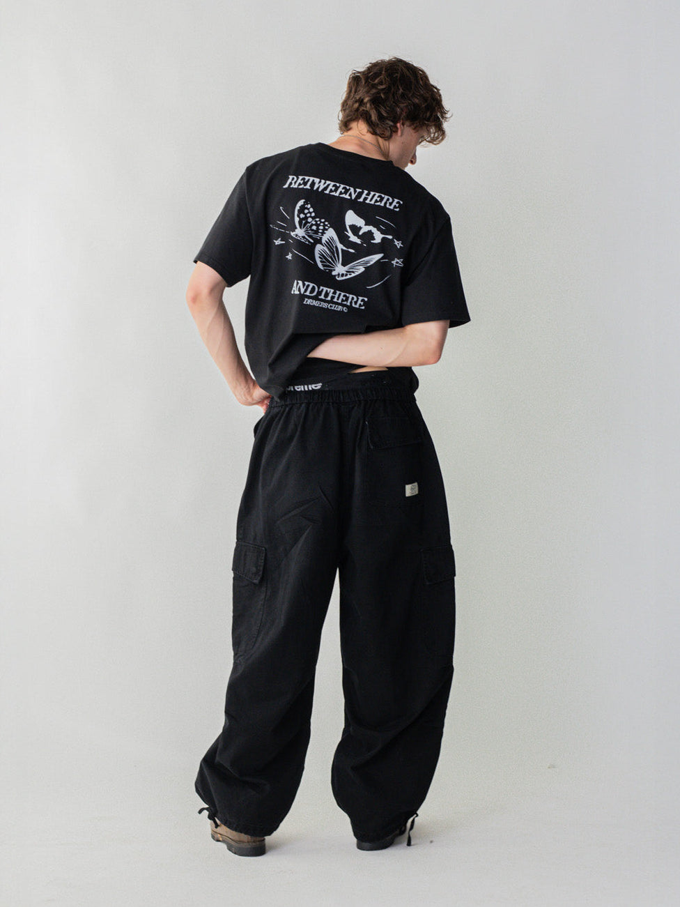SMILEY LOGO PARACHUTE PANTS - BLACK
