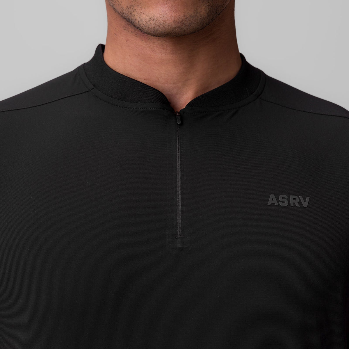 1087. Tetra-Lite® Ice Zip Tee - Black