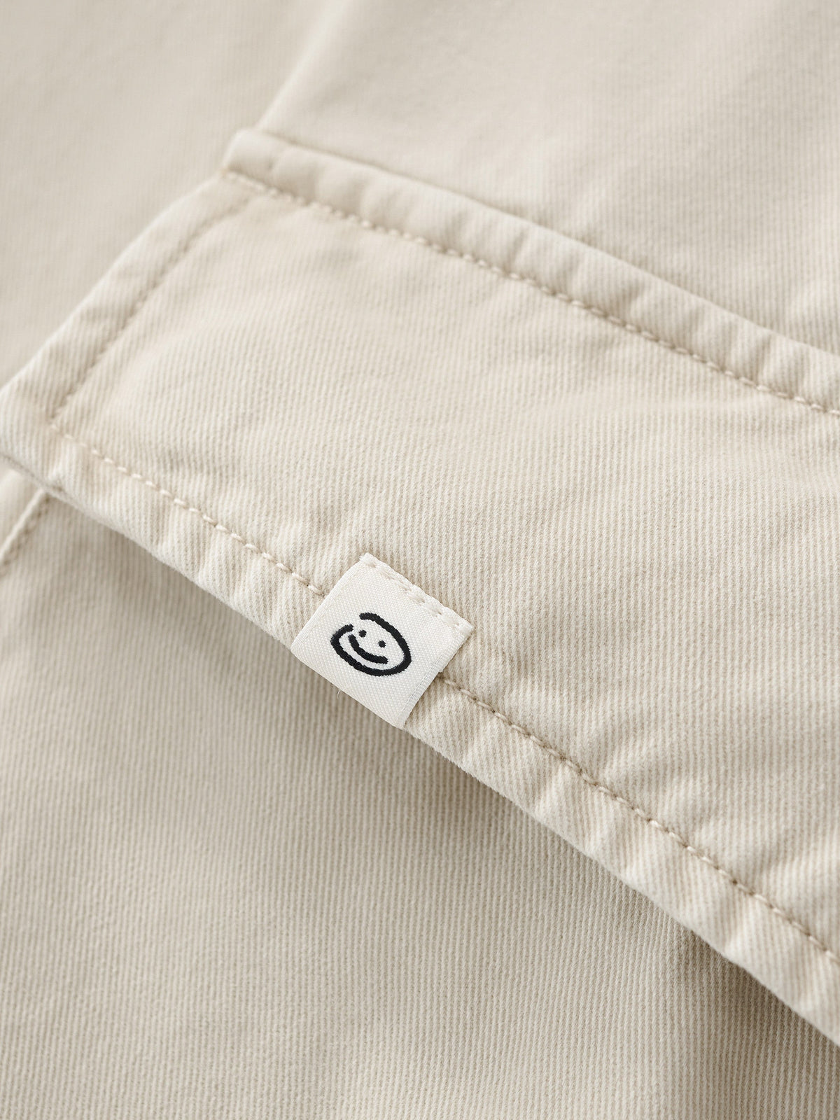 SMILEY LOGO PARACHUTE PANTS - LIGHT BEIGE