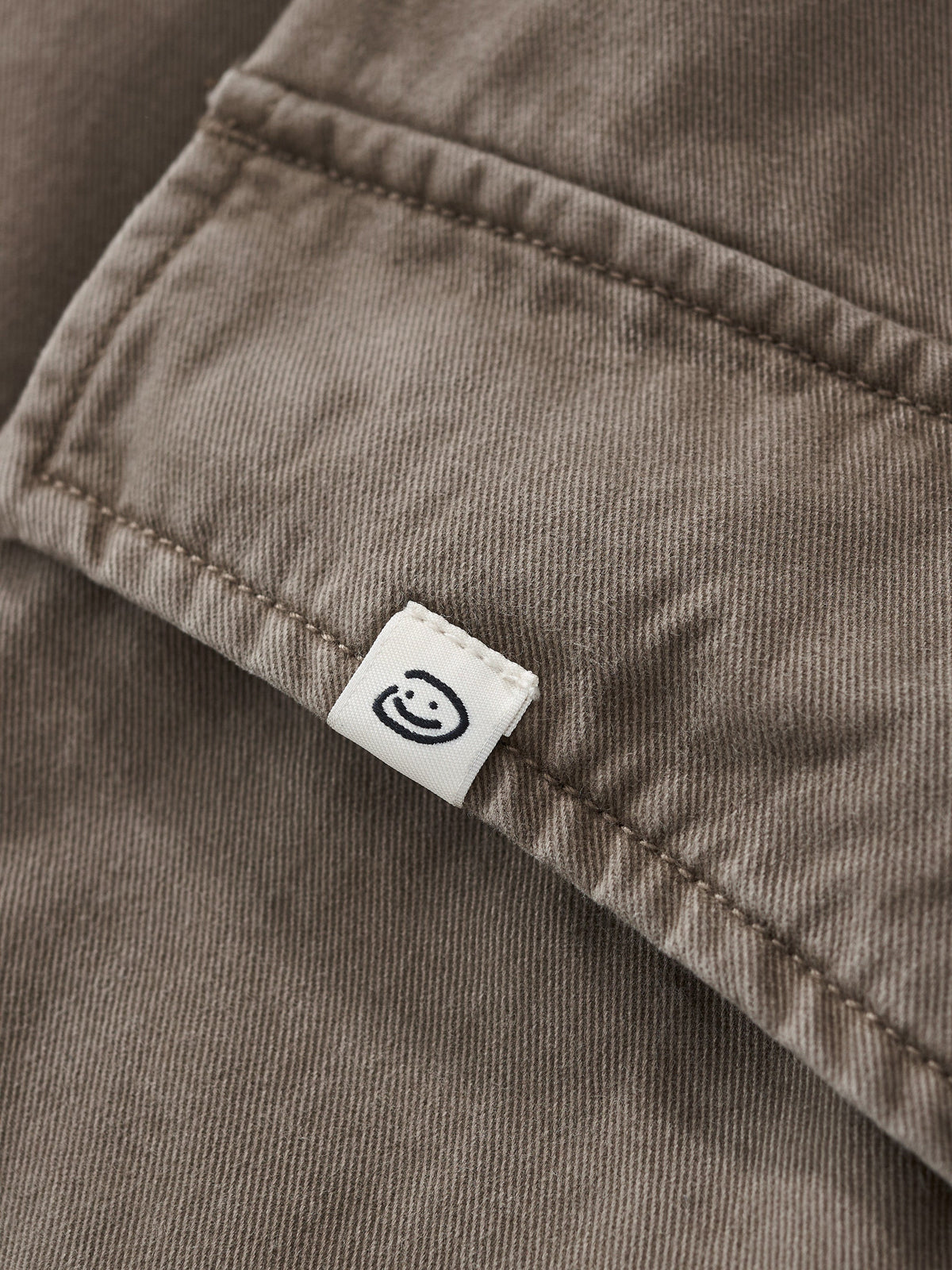 SMILEY LOGO PARACHUTE PANTS - TAUPE