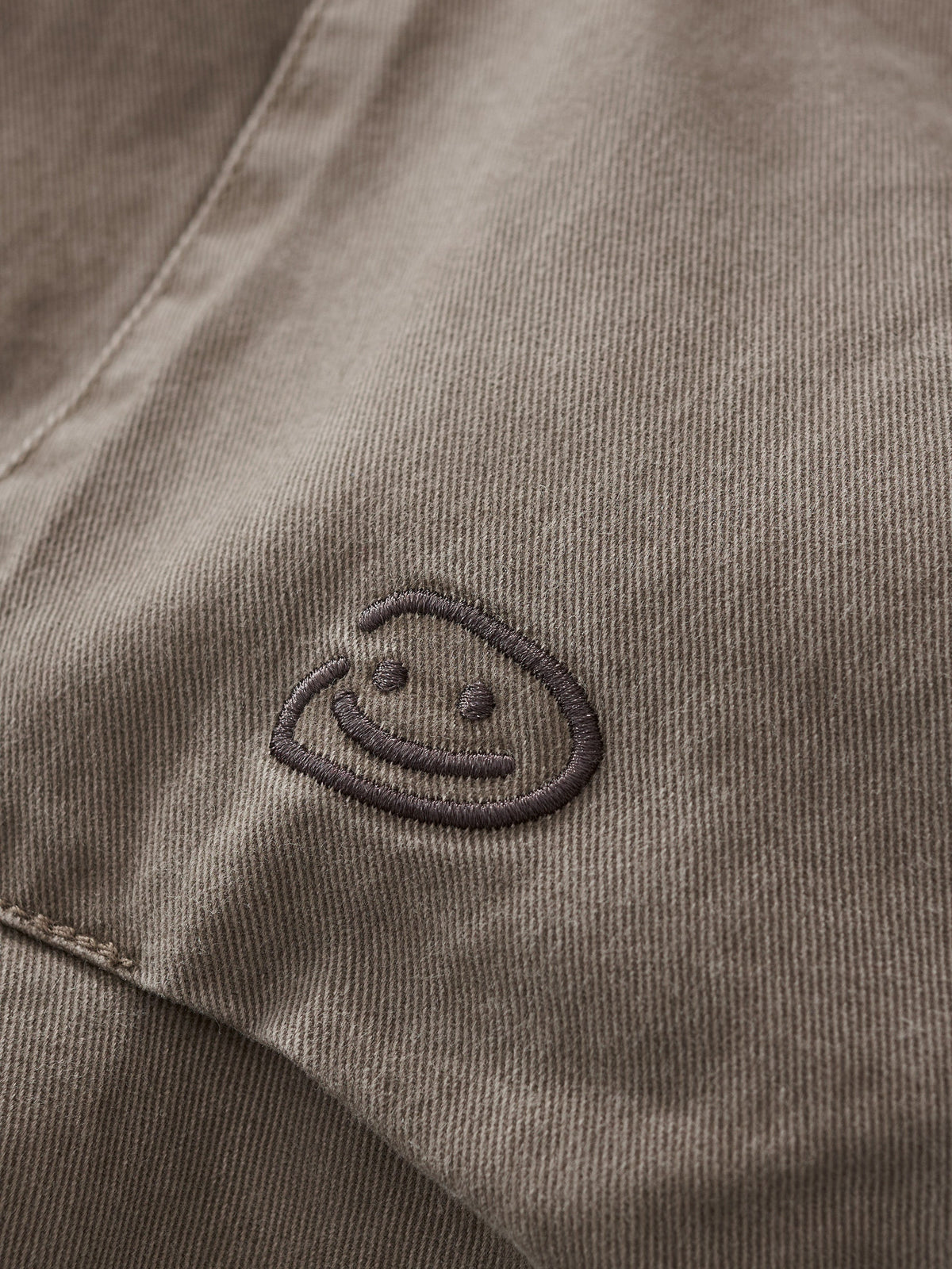 SMILEY LOGO PARACHUTE PANTS - TAUPE