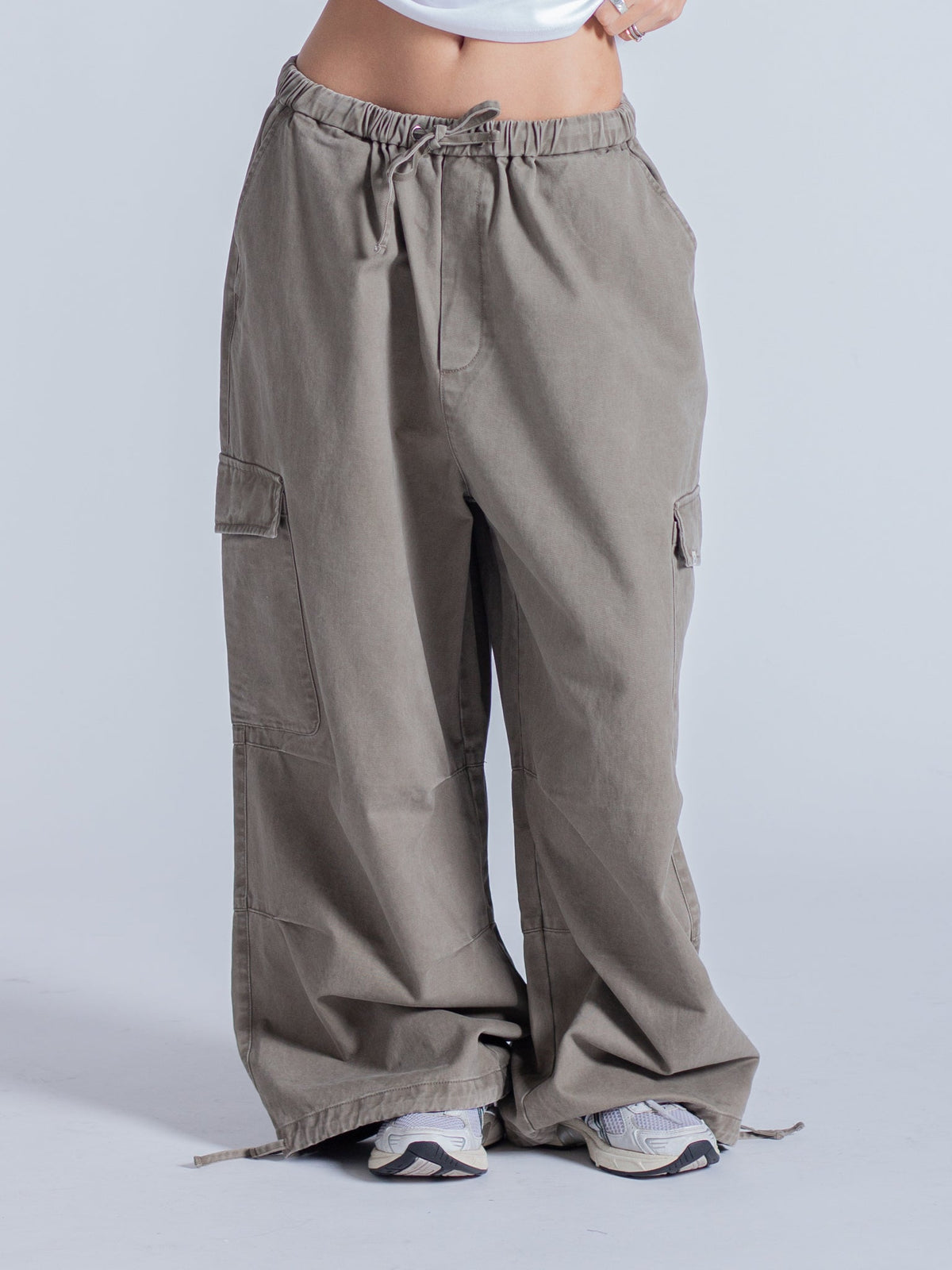 SMILEY LOGO PARACHUTE PANTS - TAUPE