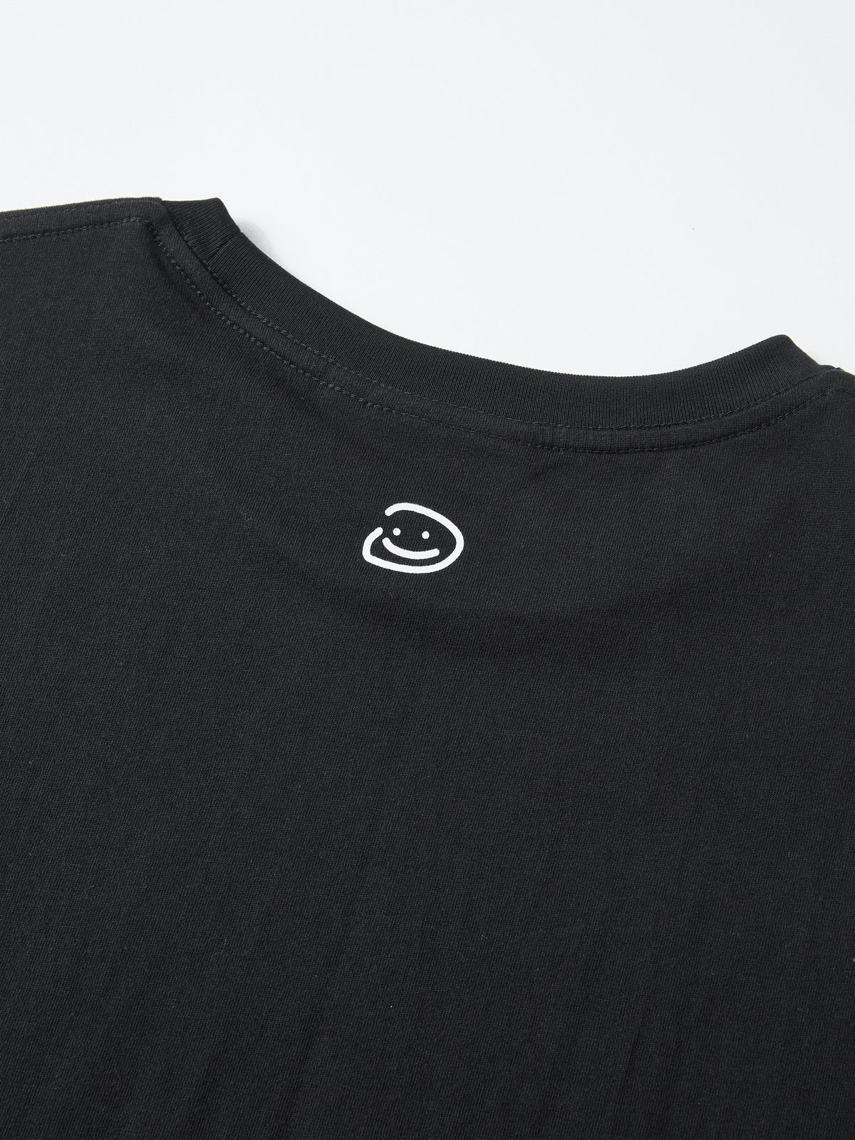 FADED STARS SMILEY TEE - BLACK