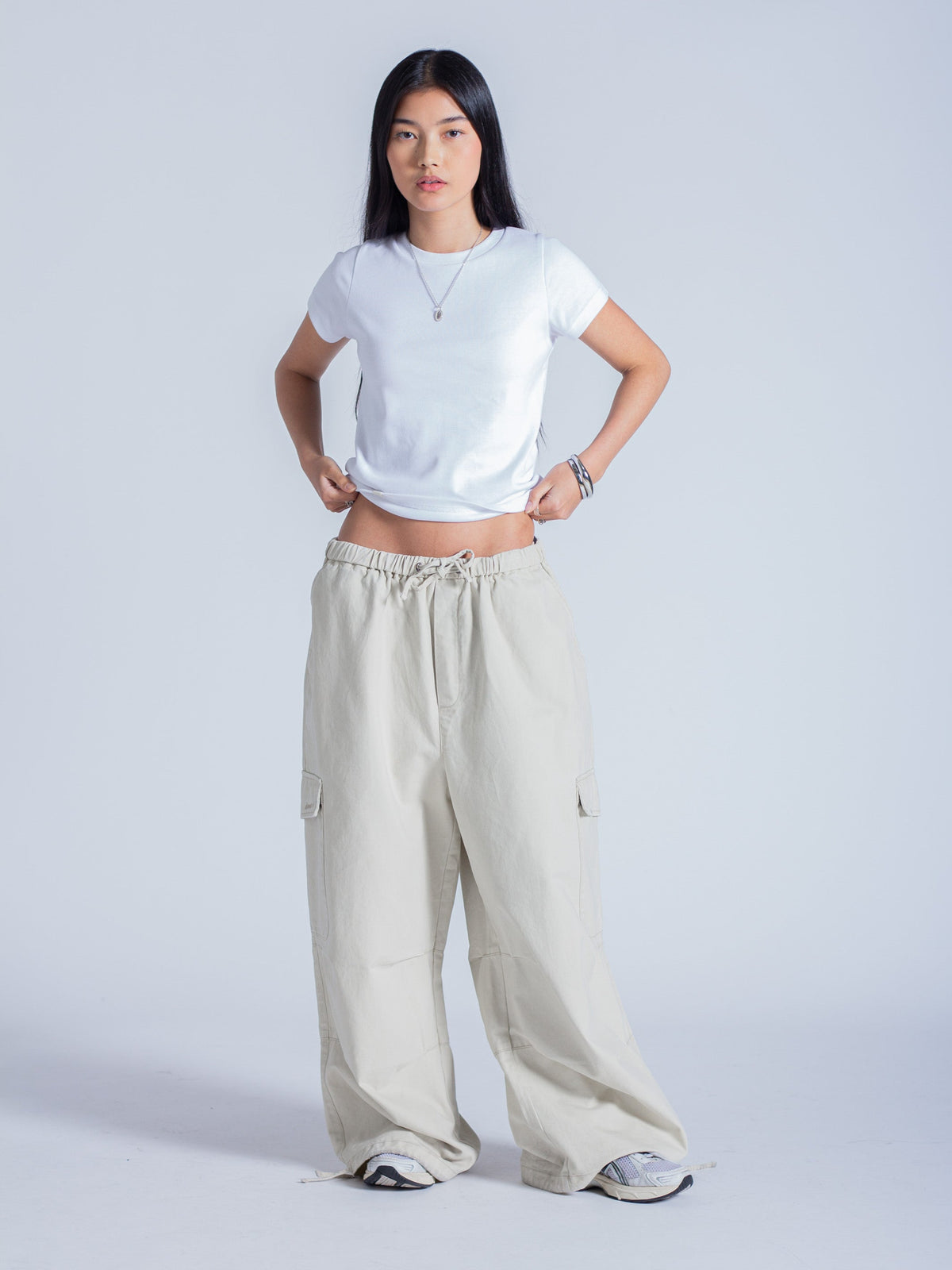 SMILEY LOGO PARACHUTE PANTS - LIGHT BEIGE
