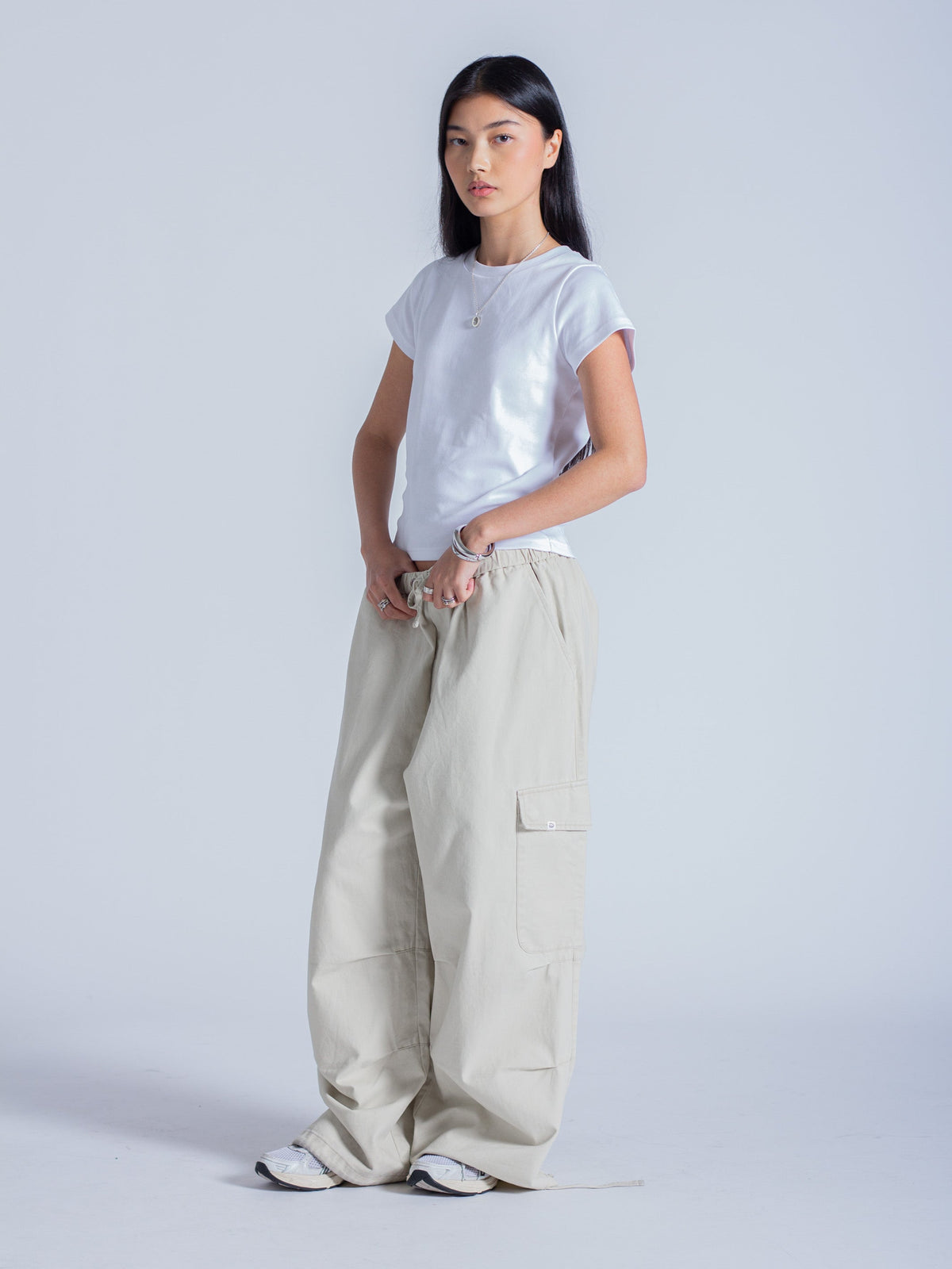 SMILEY LOGO PARACHUTE PANTS - LIGHT BEIGE