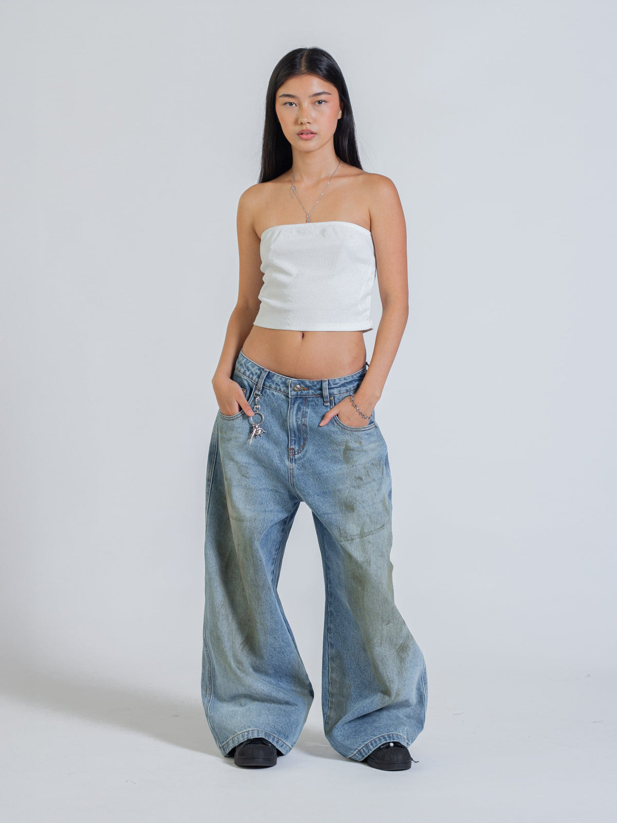 MUD STAINED JEANS - LIGHT BLUE