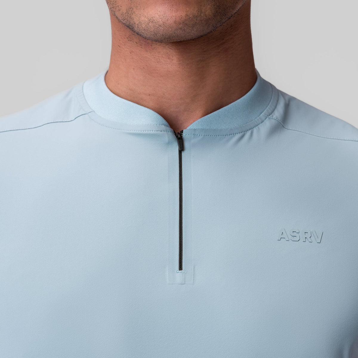 1087. Tetra-Lite® Ice Zip Tee - Light Sky