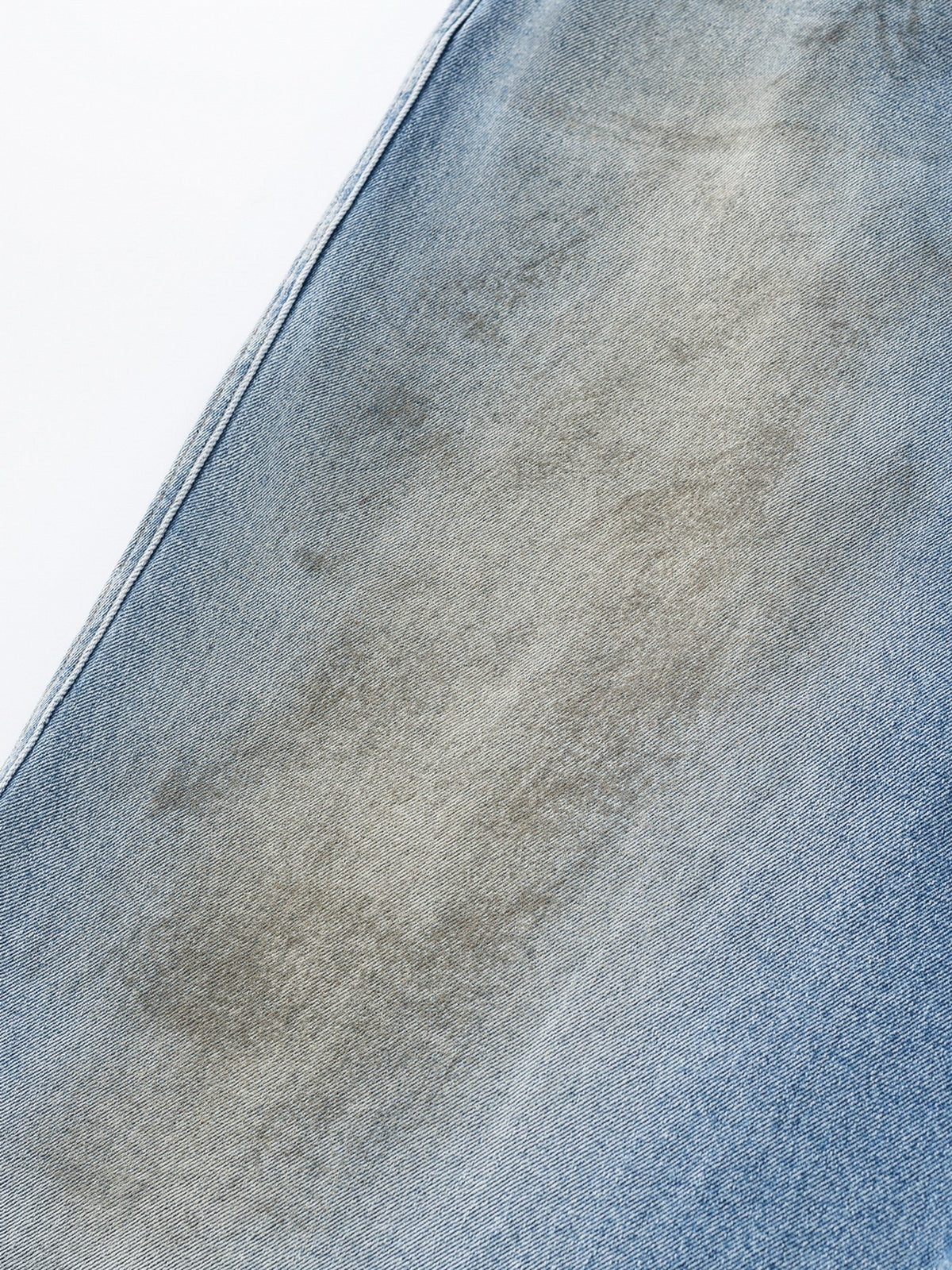 MUD STAINED JEANS - LIGHT BLUE